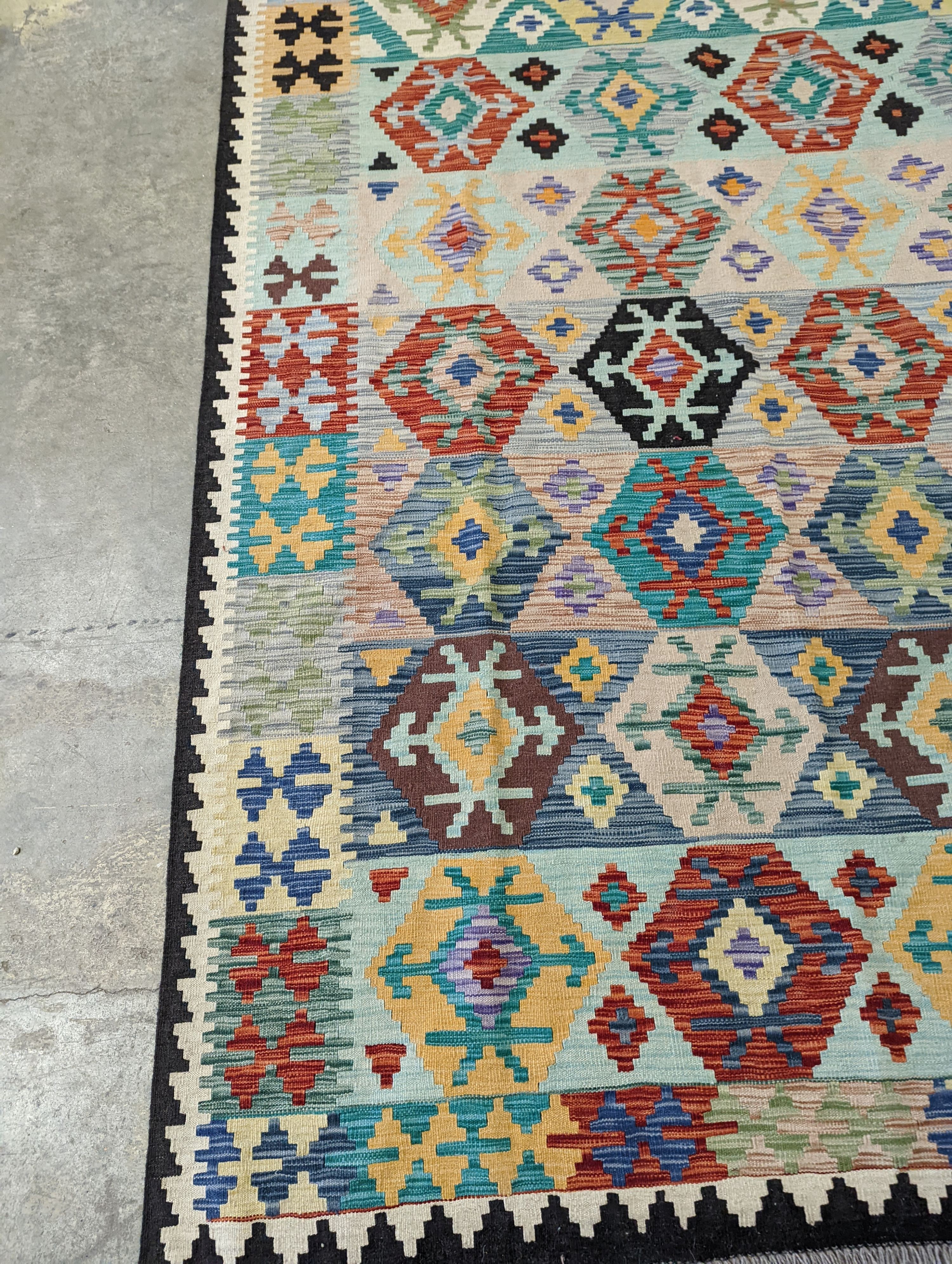 An Anatolian contemporary Kelim polychrome flatweave carpet, 300 x 204cm